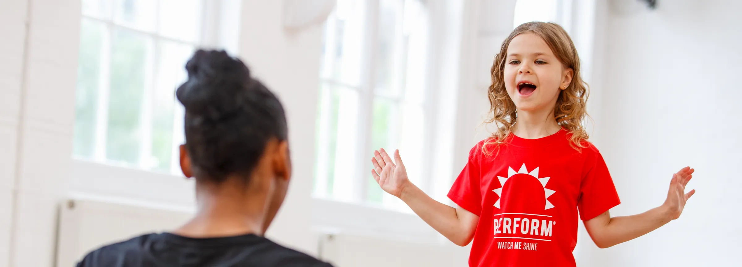 Child acting with teacher