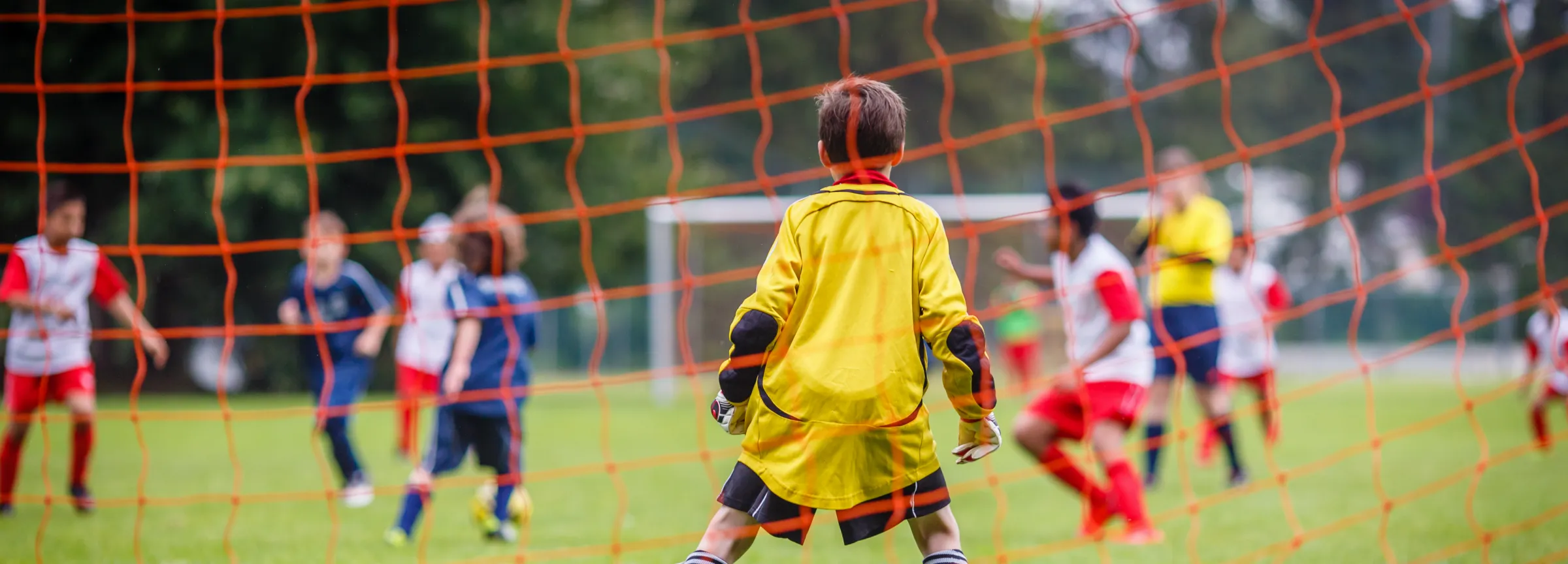 children playing football