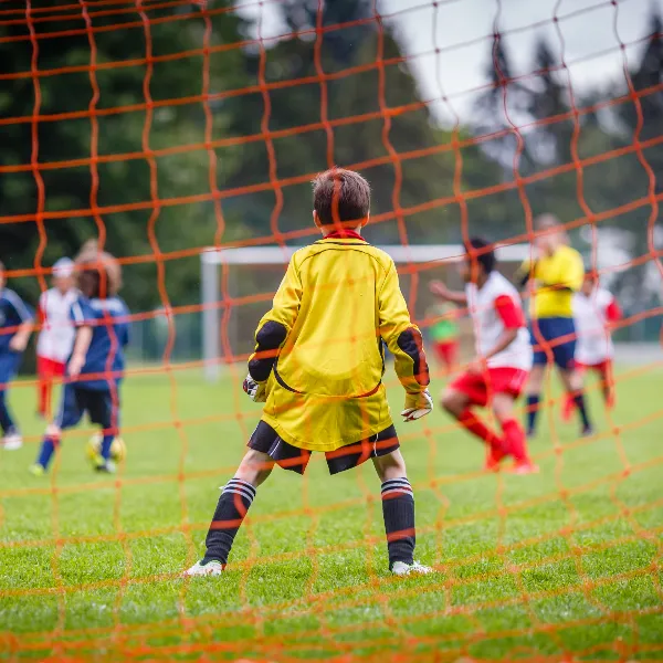 children playing football