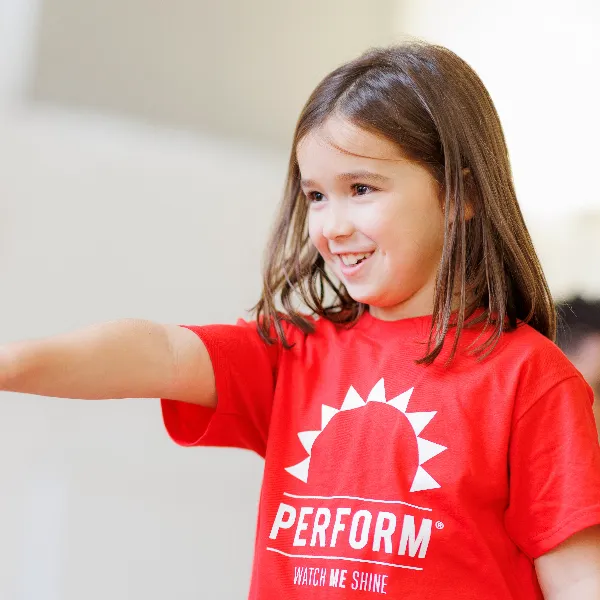 Children performing in a dance class