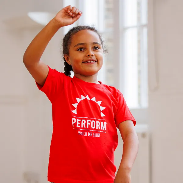 Children performing in a dance class